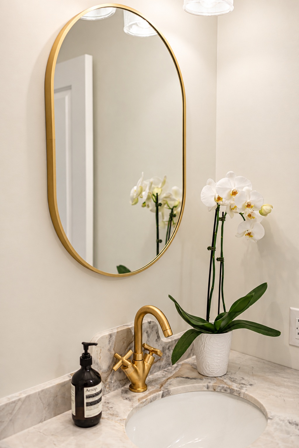 Mirror, brass and orchid